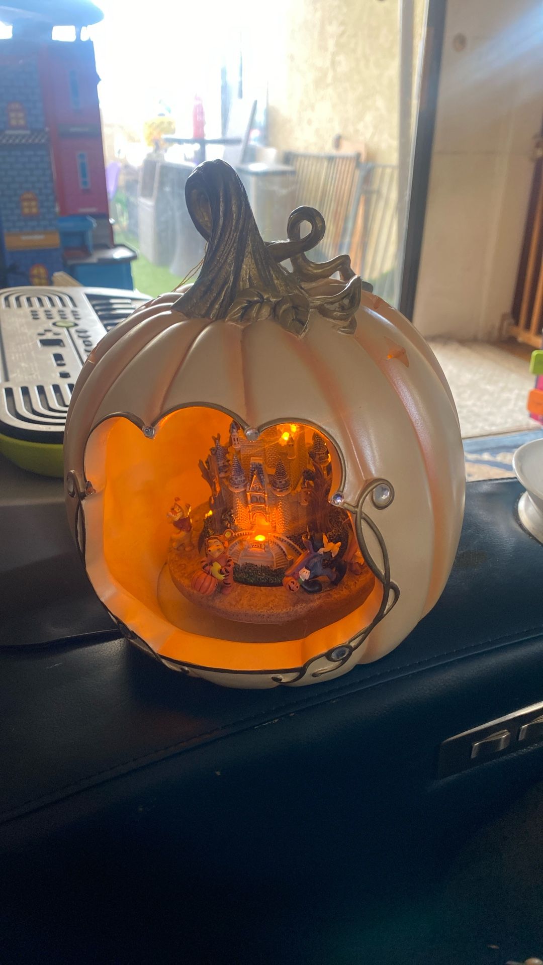 A Vintage Lighted Pumpkin With Disney Character S