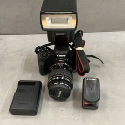 Canon Eosm50 Digital Camera With Speed, Light Flash Charger, Battery And One 35 to 80 mm ultrasonic lens