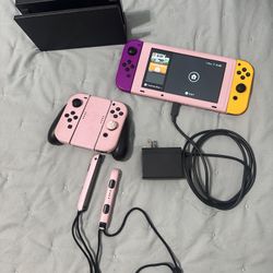 Nintendo Switch Bundle w/ Extra Controllers, Dock & Charger – Pink Cover