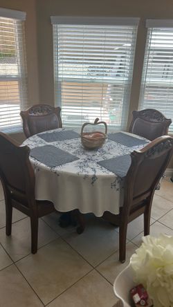 Solid wood table with four chairs