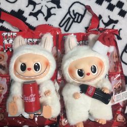 Use like New. 2 of The Monsters coca cola Labubu No Box