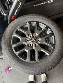 2025 Toyota Tundra Platinum wheels and tires plus spare.