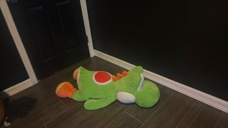 Giant sleeping yoshi from Disney
