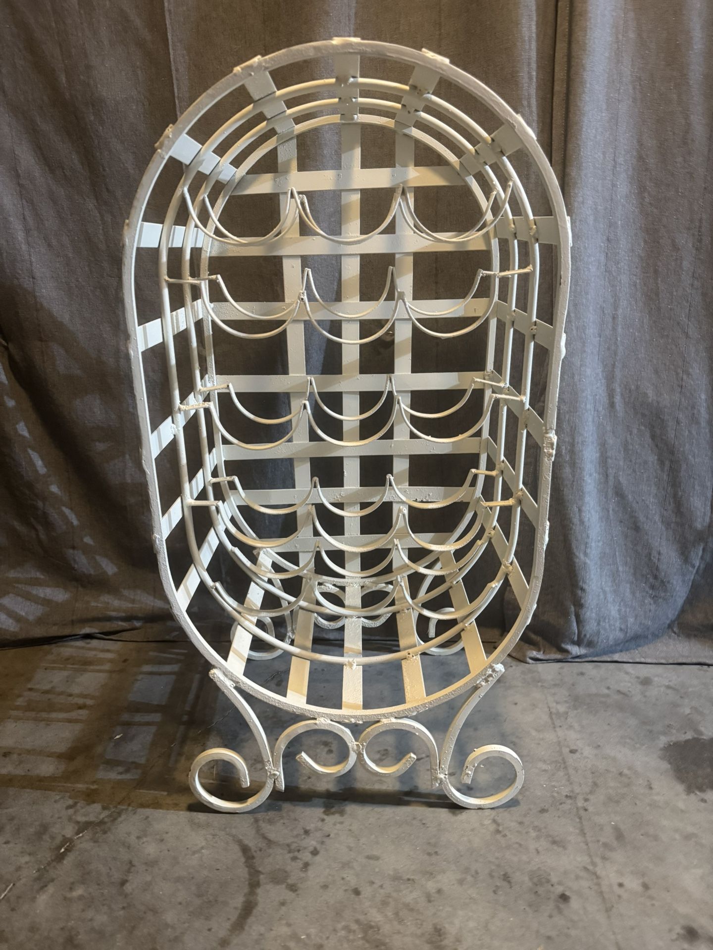 Vintage 15 bottle wrought iron wine rack