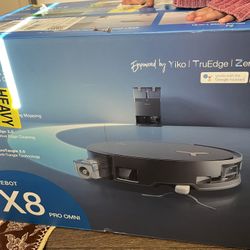 This is a robot vacuum cleaner (ECOVACS DEEBOT X8 Pro Omni).