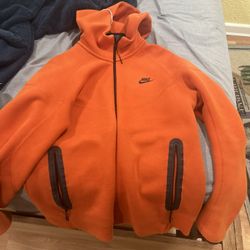 orange nike tech