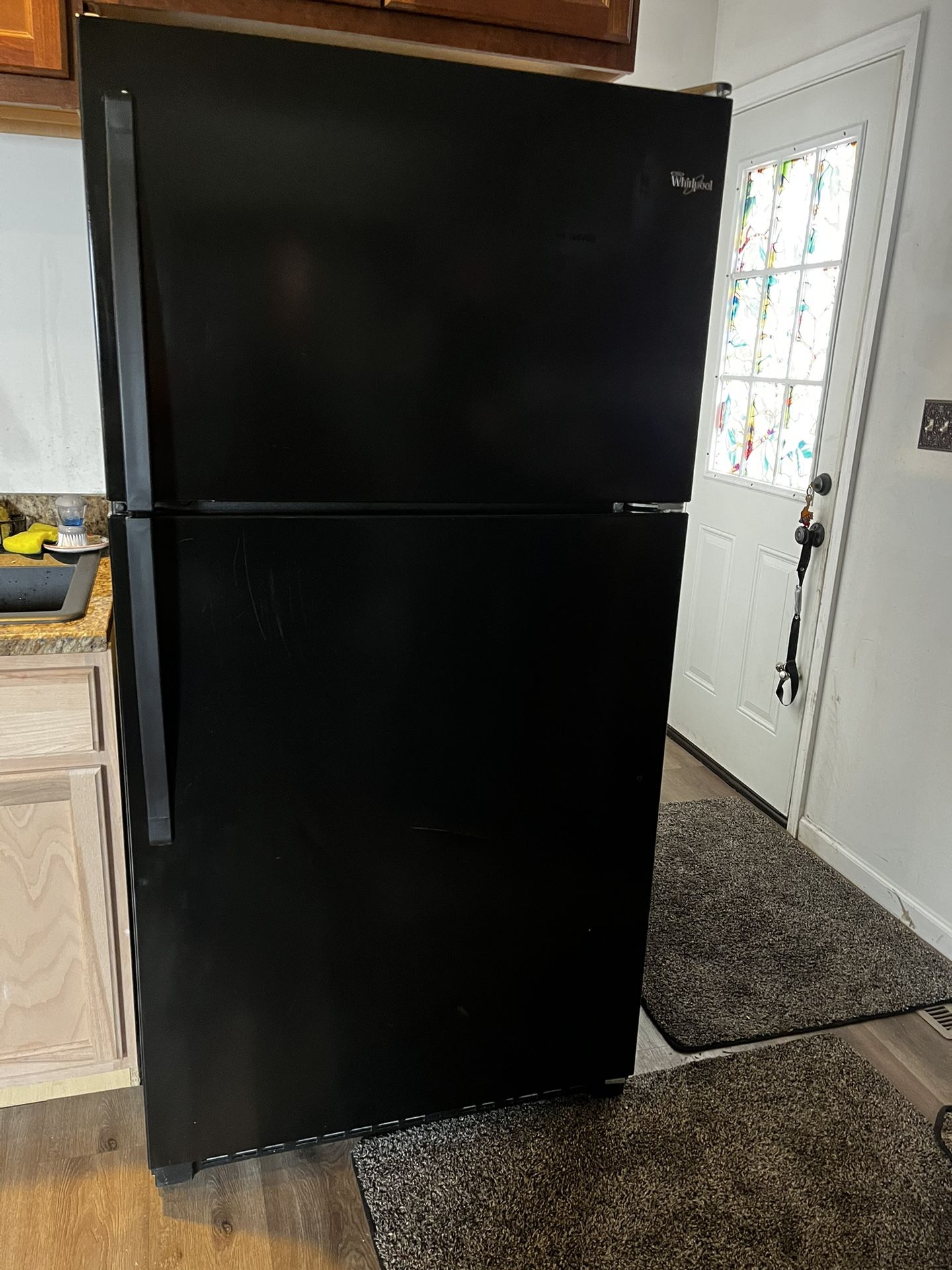 Black WHIRLPOOL 28 Inch Top Freezer Refrigerator with 16 cu. ft. Capacity