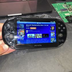 Sony PlayStation Vita Slim PCH 2001 PS VITA w/ Hard Case, Charging Cable, 8GB Memory Card