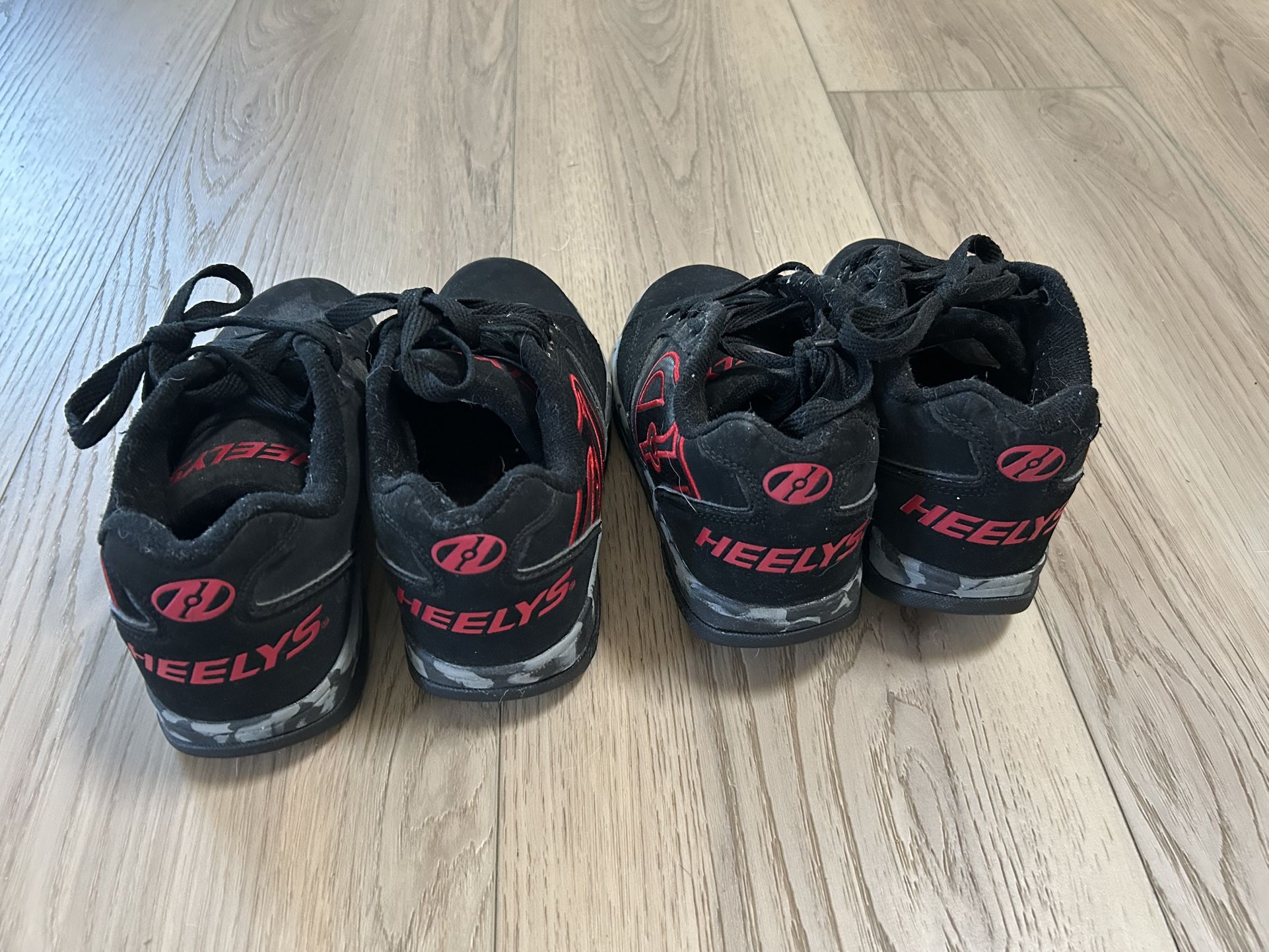 Two Pairs Of Heeleys