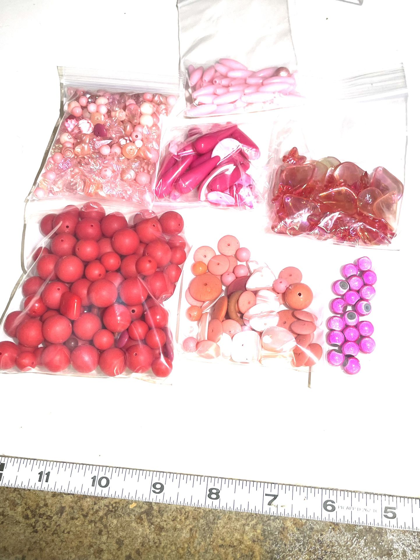 Lot Of Pink And Red Plastic Beads