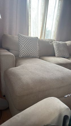Beige sofa couch