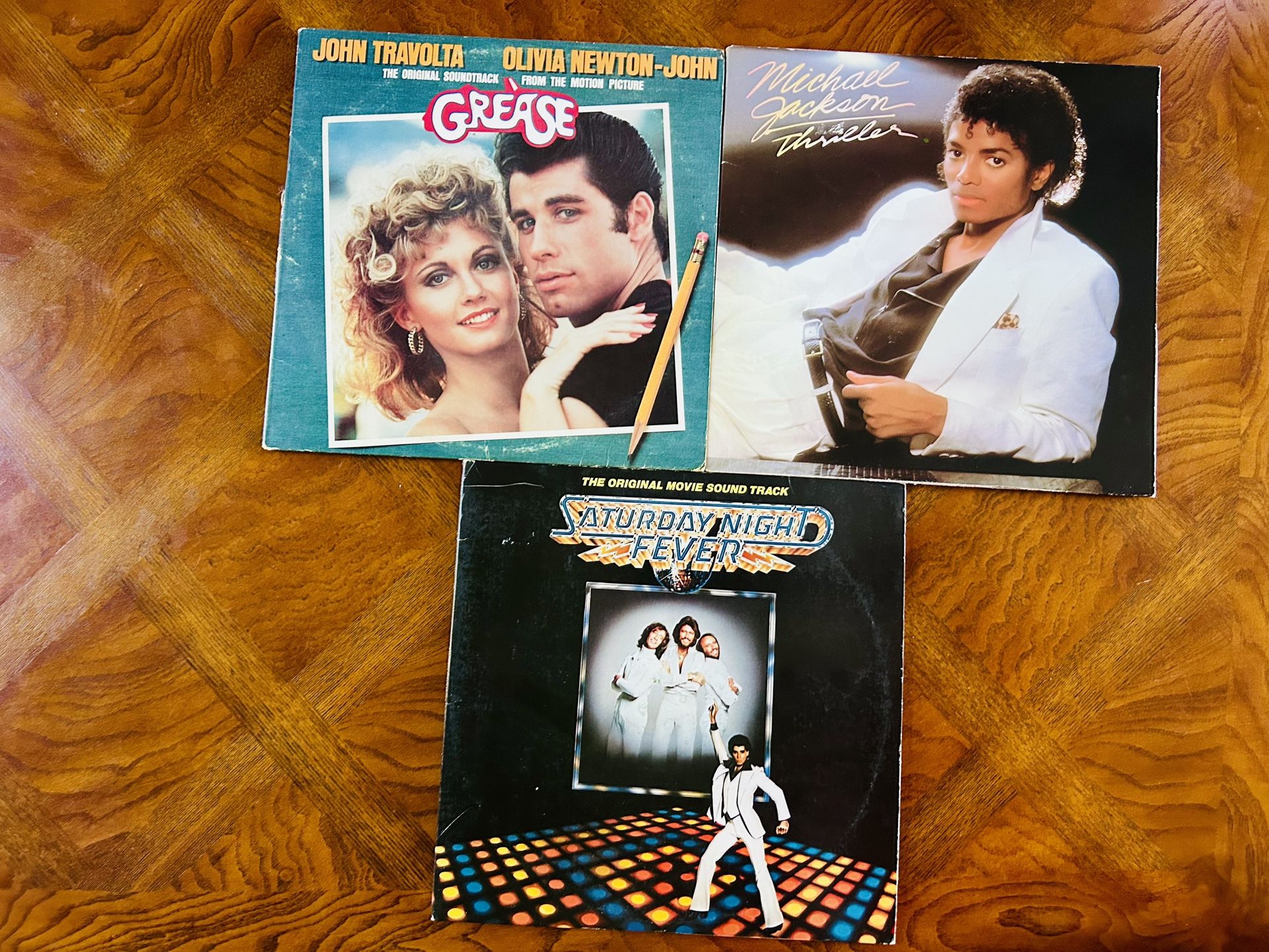 Vinyl Records Saturday Night Fever, Grease, and Thriller