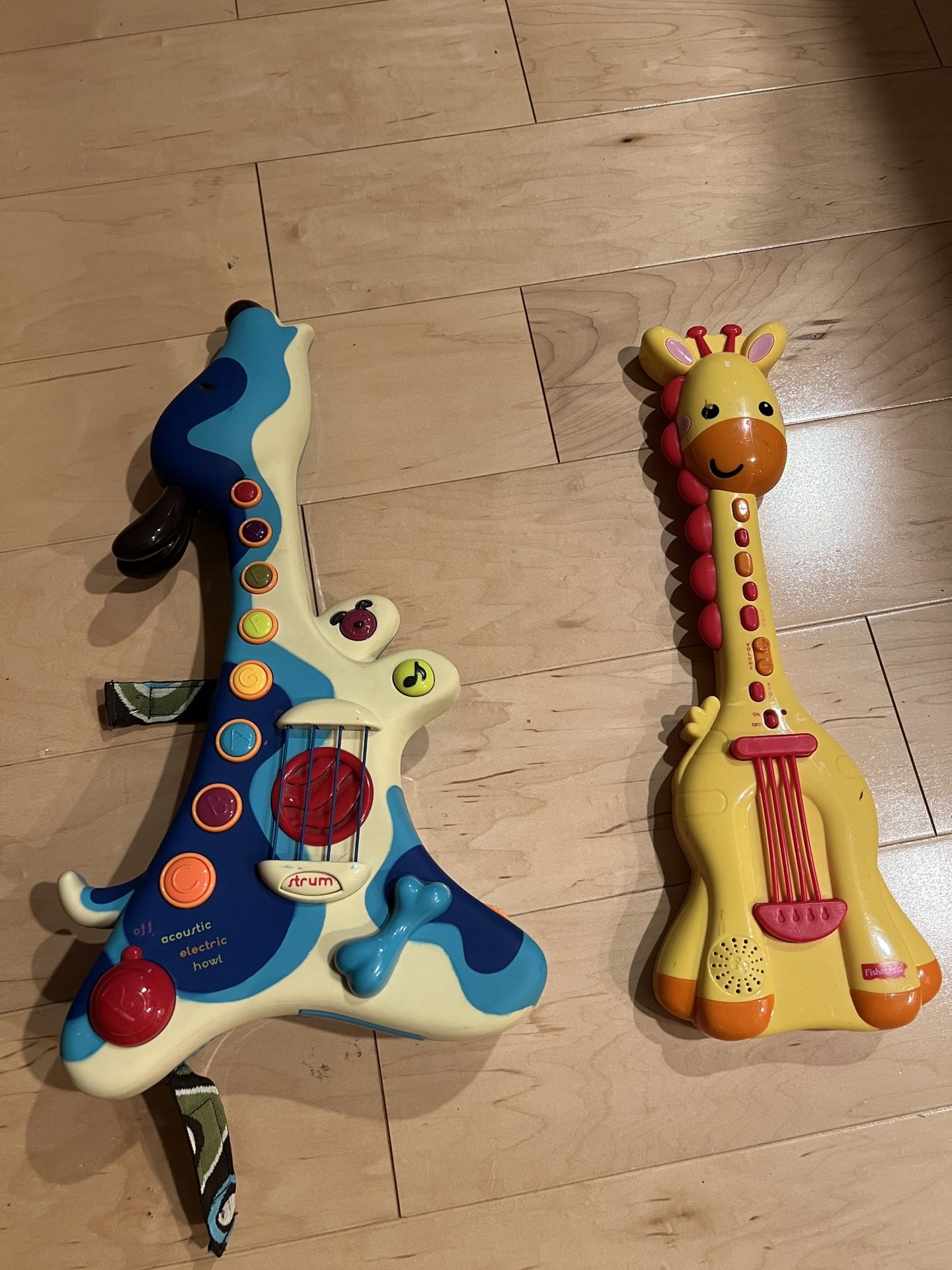Two Toy Guitars