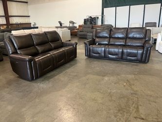 Leather power reclining sofa set