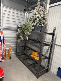 four-tier industrial steel shelving unit measures
