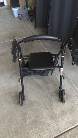 Walker with seat