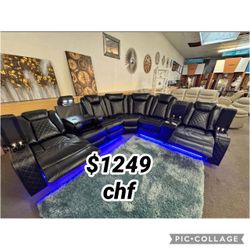 Black leather reclining sectional sofa with led light , wireless charger 