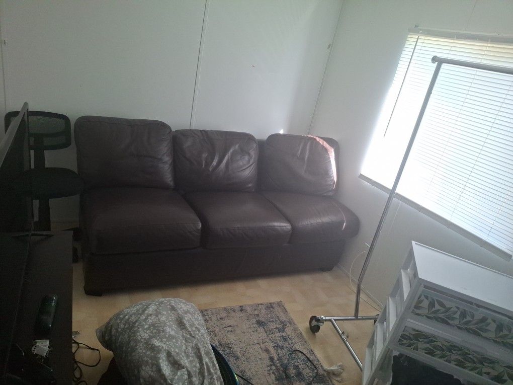 Dark Brown Leather Couch (2) peices