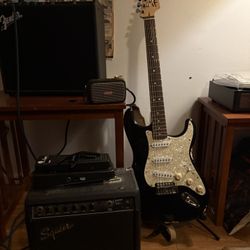 Guitar, Amp, Wah pedal, and Capo