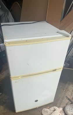 White mini fridge