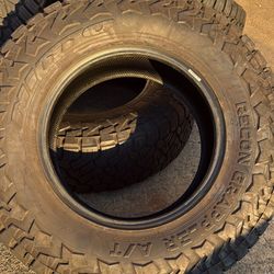 FREE DELIVERY 4x LIKE NEW NITTO RECON GRAPPLER AT 295/70R18 97% TREAD 6 PLY