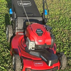 Toro smart stow self propelled lawn mower  With bagger 