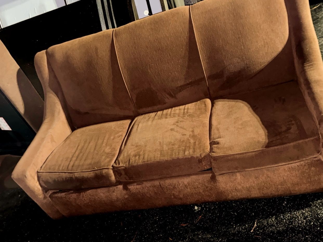 Sofabed And Granite Coffee Table.