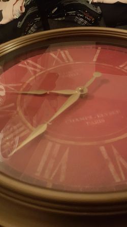 Rustic red an gold clock..good condition