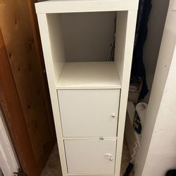 A Three Drawer High Cabinet For The Bathroom White Color