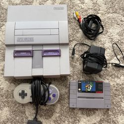 Super Nintendo Console With Super Mario World