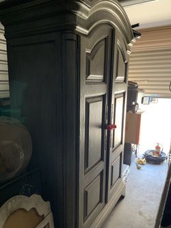 Grey armoire. Extremely heavy.