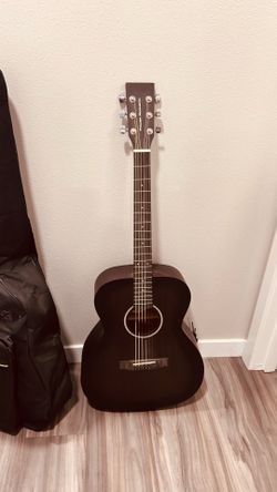 Acoustic guitar along with bag