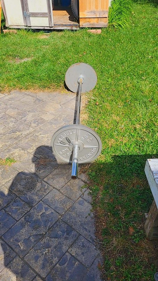 45lb Olympic Weight Bar With 45 And 35 Lb Plates