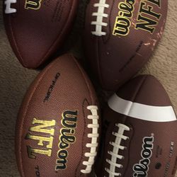 4 Wilson Footballs