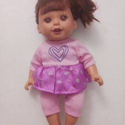 Barbie Doll Pink Shirt Pants And A Purple Skirt And A Scrunchie