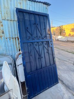 Wrought Iron Door In Good Condition  6ft 10 in length 3 ft 2 in width (Chelmont Center Area)
