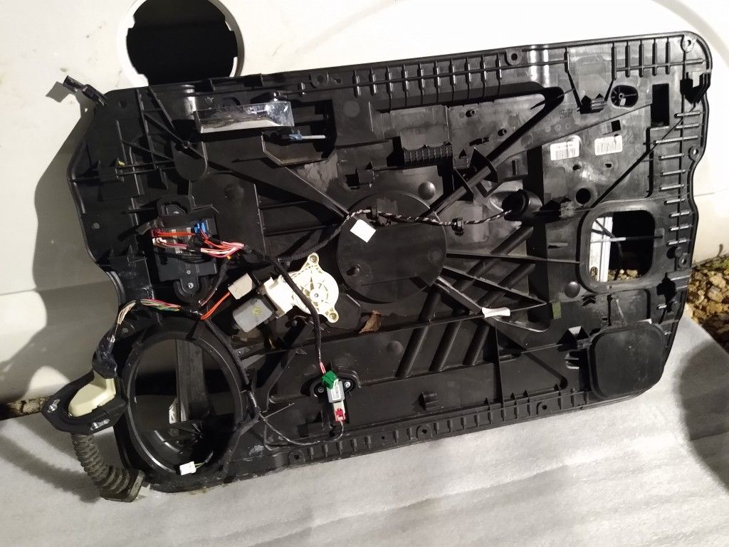 RH Dodge Ram inner door panel with crone handle and window motor and other parts