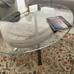 Matched Round Glass Top End Table And Oval Glass Top Coffee Table
