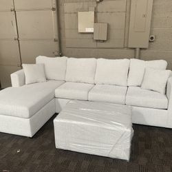 White Cream Sectional Couch And Ottoman 