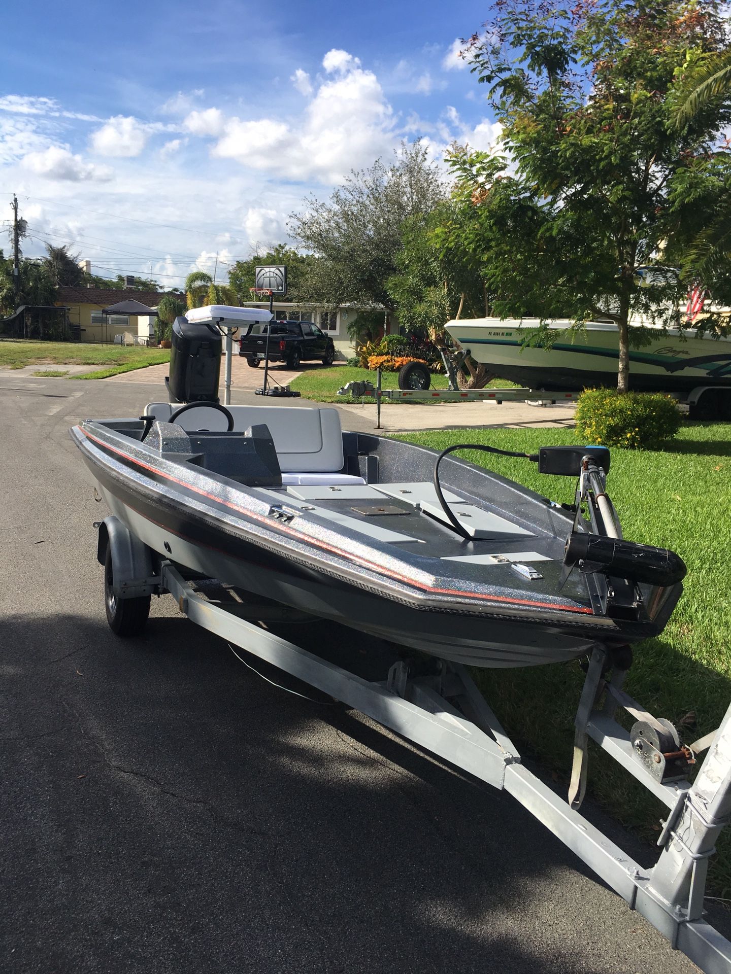 16ft Bomber bass boat 100hp mercy and trailer