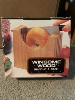 A Winsome Wood branded bagel slicer