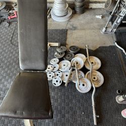 Standard weights 125lbs Total plus curl bar and adjustable dumbbells and bench