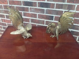 Brass fighting roosters