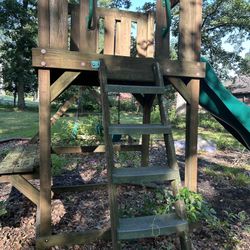 Outdoor Wooden Swing Set And Slide. 
