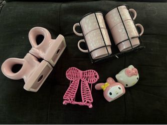 Pink kitchen items salt shaker and such