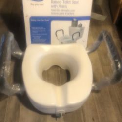 Brand New Raised Toilet Seat with Arms