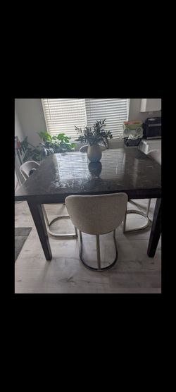 Dining table and 4 chairs