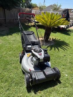 Murray
22 in. 140 cc Briggs & Stratton Walk Behind Gas Self-Propelled Lawn Mower with Front Wheel Drive and Bagger