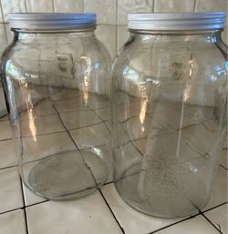 Gallon Glass Jar with metal lid. Used only once for drinking water. $8