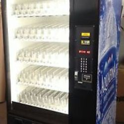 Soda and snack vending machine